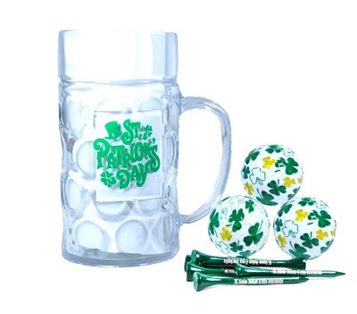 1 clear mug with St Patrick's Day printed on it filled with 20 green Tees with Kiss Me I'm Irish printed on them and 3 white golf balls with green and gold Shamrocks on them.