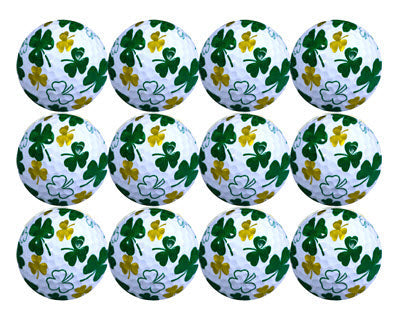 1 dozen white golf balls with green and gold shamrocks all over it.